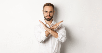 angry-businessman-frowning-showing-cross-stop-you-telling-no-prohibit-something-standing-ove. Positive Punishment